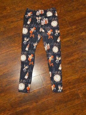 Black And Gold Festive Print Leggings with Red Accents